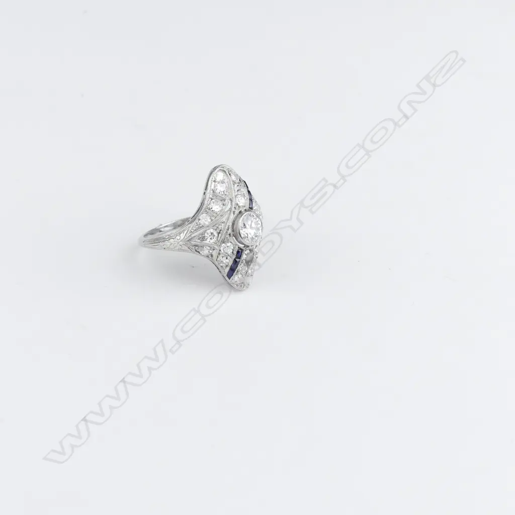 A platinum diamond and sapphire Art Deco ring Image 1++