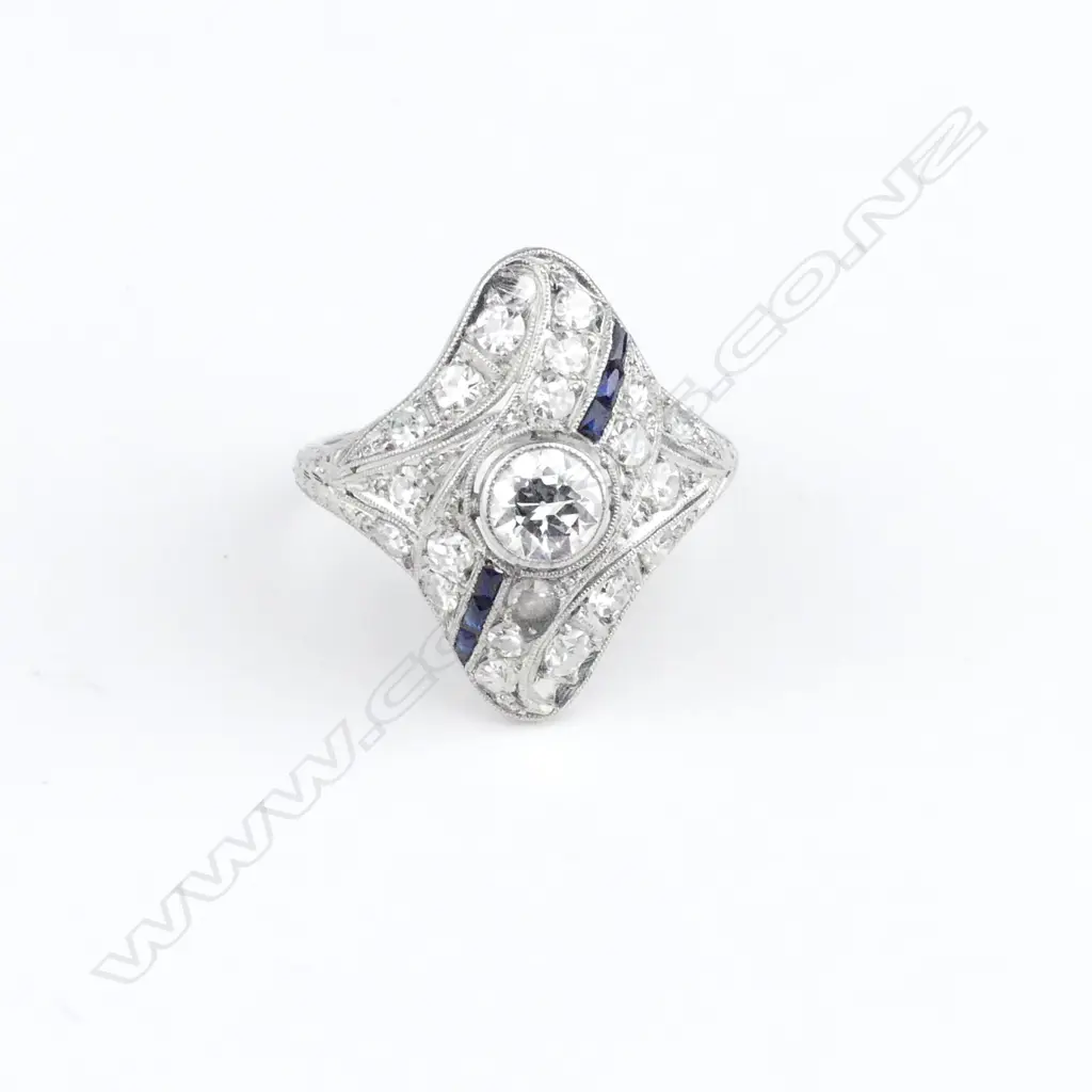 A platinum diamond and sapphire Art Deco ring Image 1++