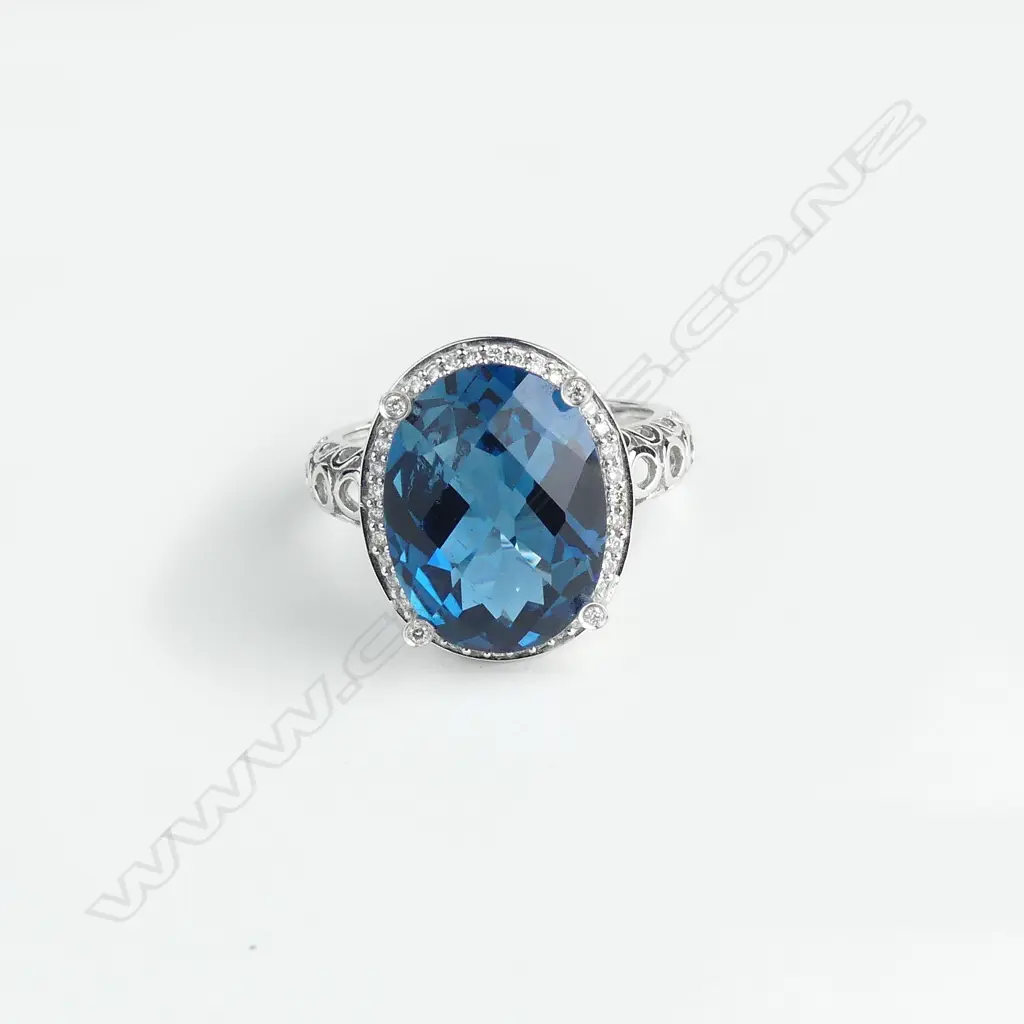 A 9ct white gold blue topaz and diamond ring Image 1++