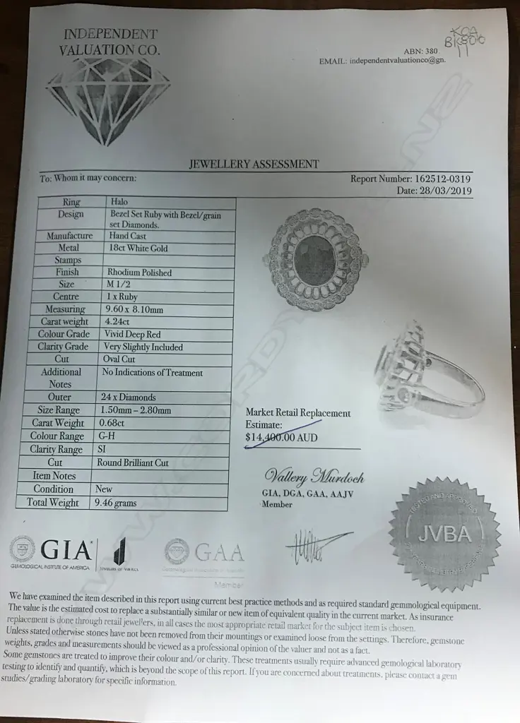 An 18ct white gold ruby and diamond ring Image 1++