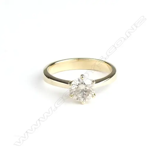 A 14ct gold and cognac diamond solitaire ring