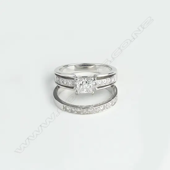 An 18ct white gold and diamond ring set