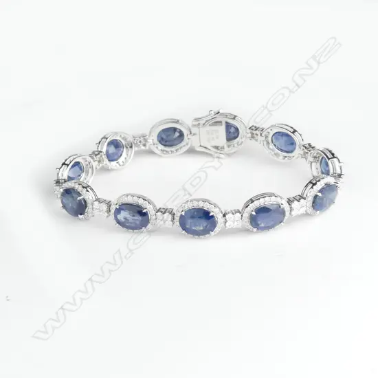 An 18ct white gold sapphire and diamond bracelet