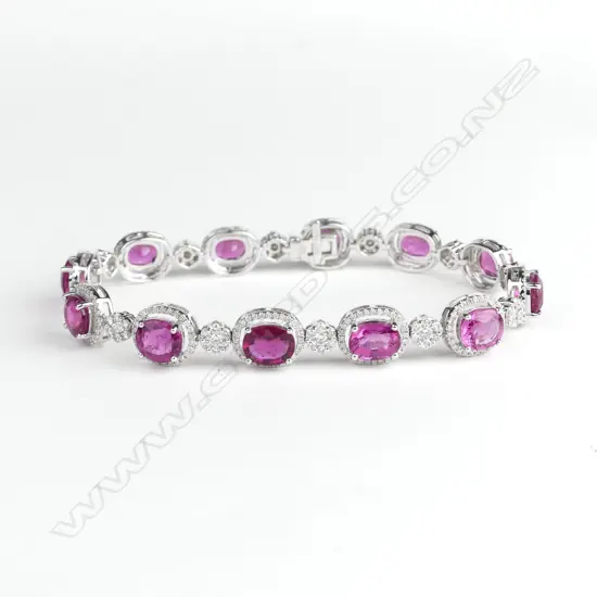 An 18ct. white gold lady's modern pink tourmaline and diamond multi-cluster bracelet