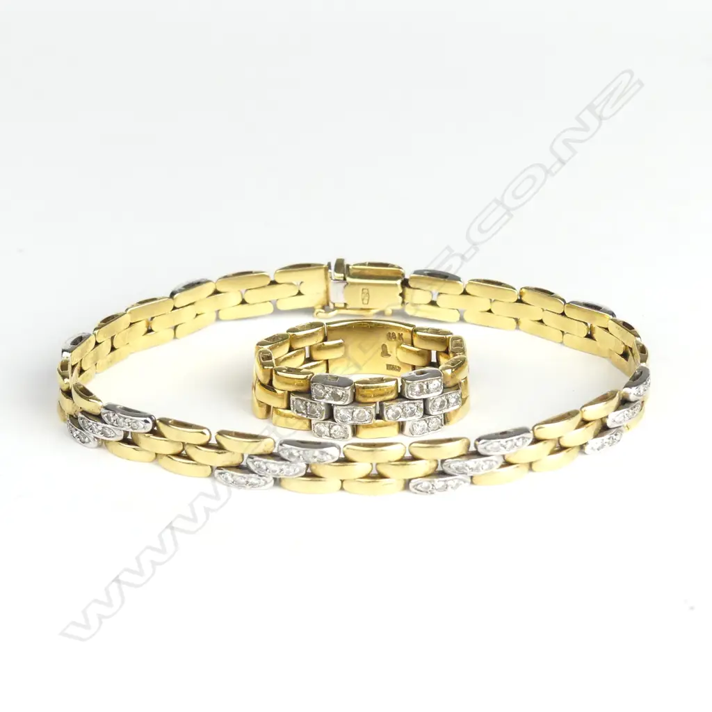 An 18ct gold and diamond bracelet with matching ring Image 1++