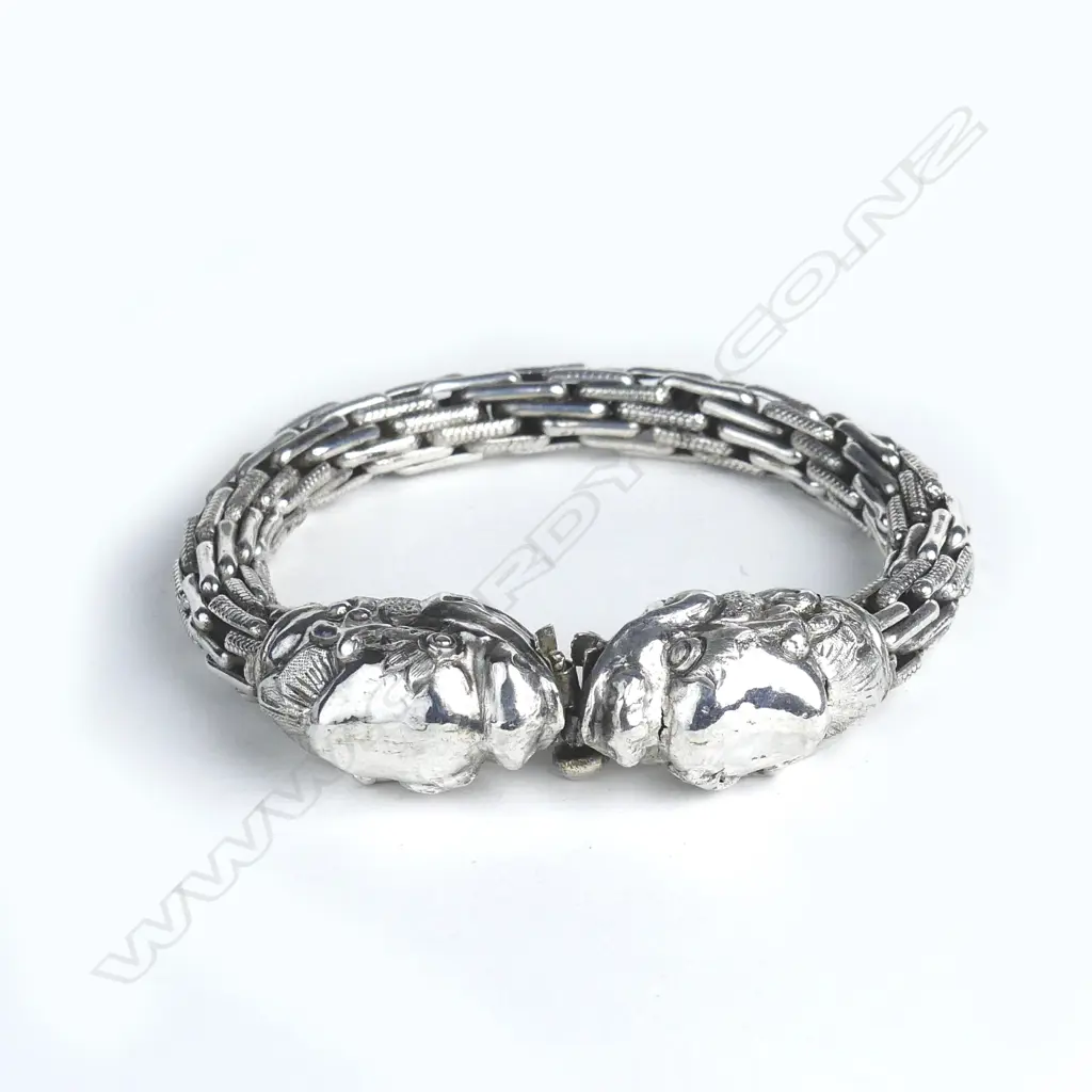 An eastern silver dragon headed bracelet Image 1++