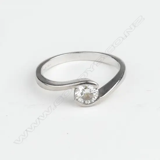 An 18ct white gold and diamond solitaire ring