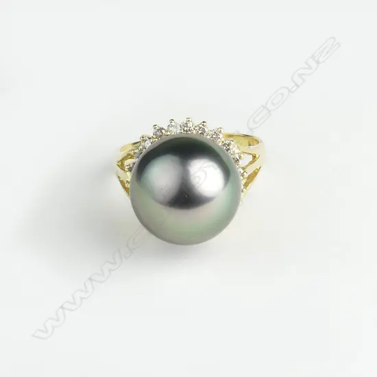 An 18ct gold Tahitian black pearl and diamond ring