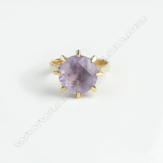 A 9ct gold retro and amethyst ring