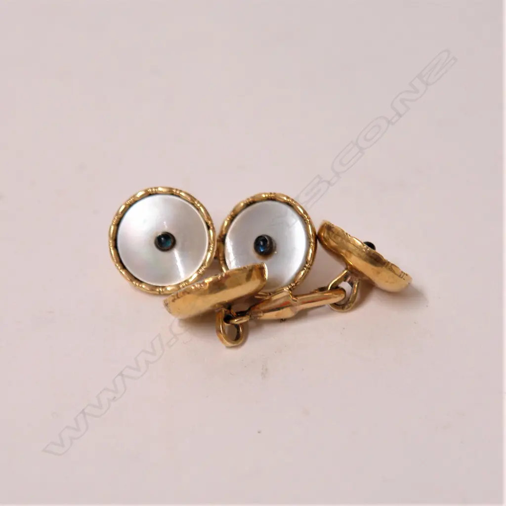 A pair of early 20thC 14ct. yellow gold and mother-of-pearl cufflinks Image 1++