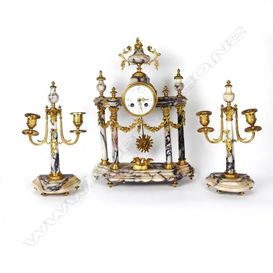 A French three piece clock garniture