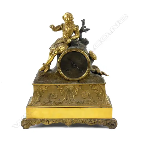 A 19thC French gilt metal sculptural mantel clock