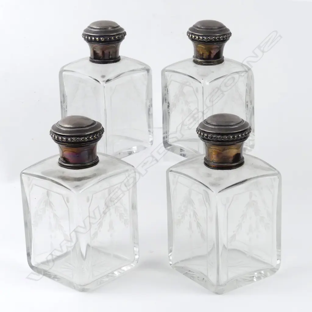 Four early 1900s French dressing table bottles Image 1++