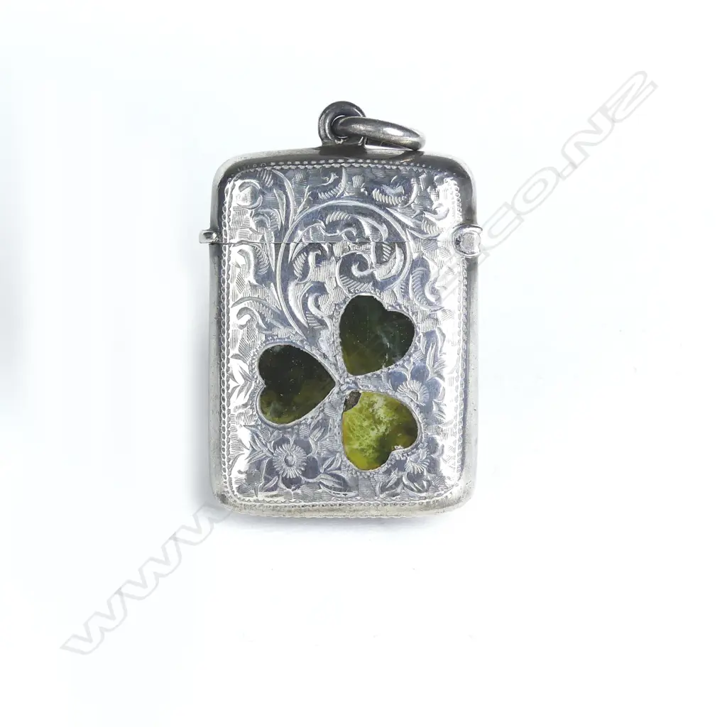 An Edwardian silver shamrock decorated vesta Image 1++