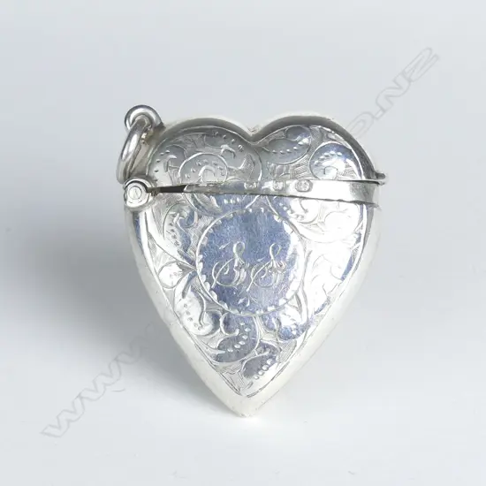 A late Victorian silver heart form vesta