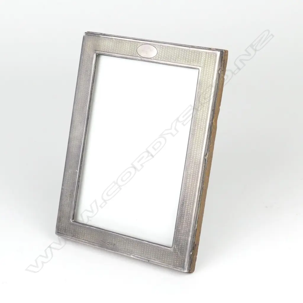 A silver photo frame Image 1++