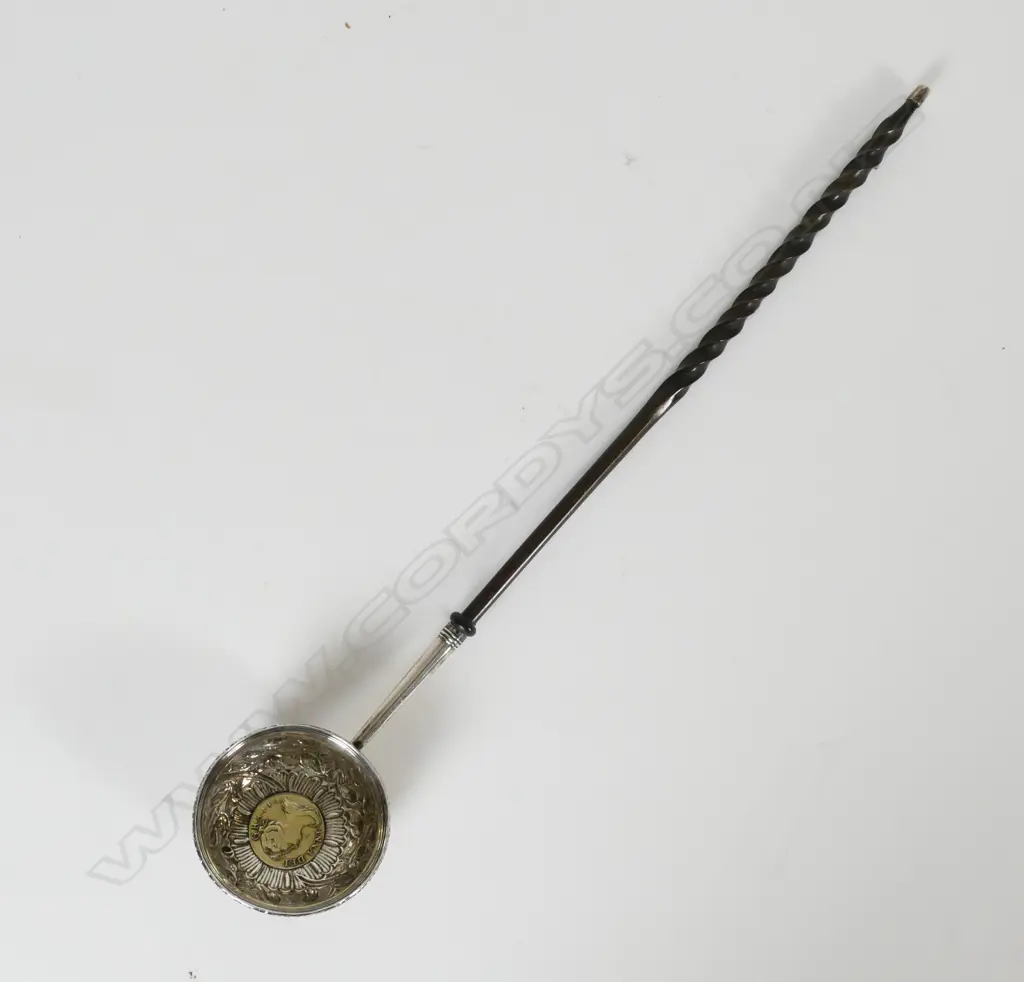 An 18thC silver toddy ladle Image 1++