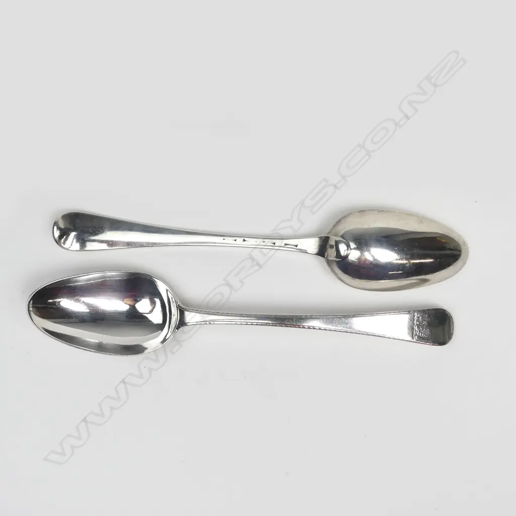A pair of George III bottom marked silver tablespoons Image 1++