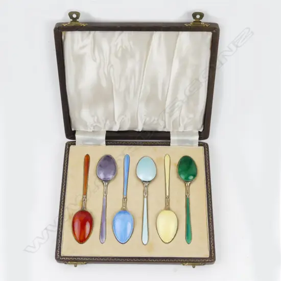 A set of six Edwardian silver and coloured enamel coffee spoons