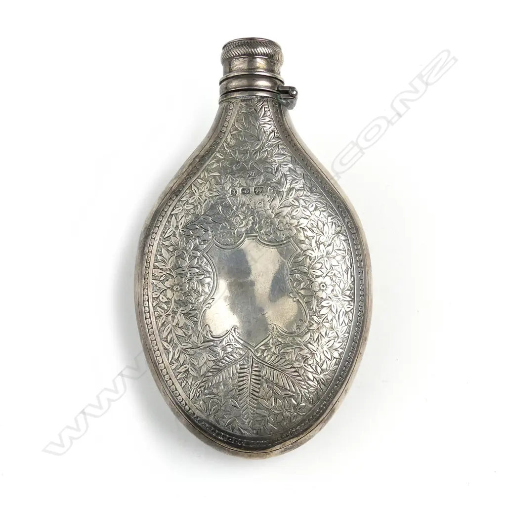A Victorian silver hip flask Image 1++