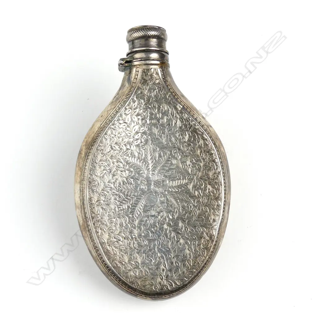 A Victorian silver hip flask Image 1++