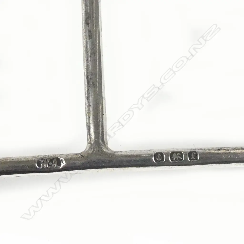 An Edwardian silver toast rack Image 1++