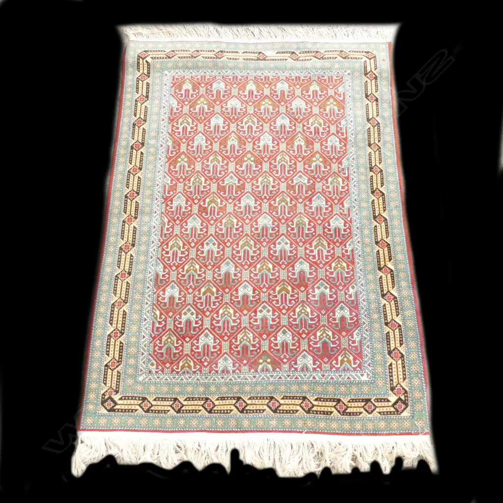 A Caucasian hand knotted rug Image 1++