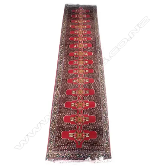 A hand knotted Persian runner