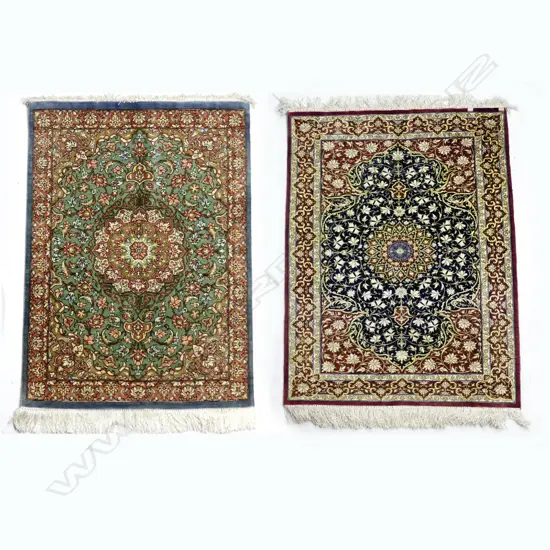 Two silk Hereke rugs