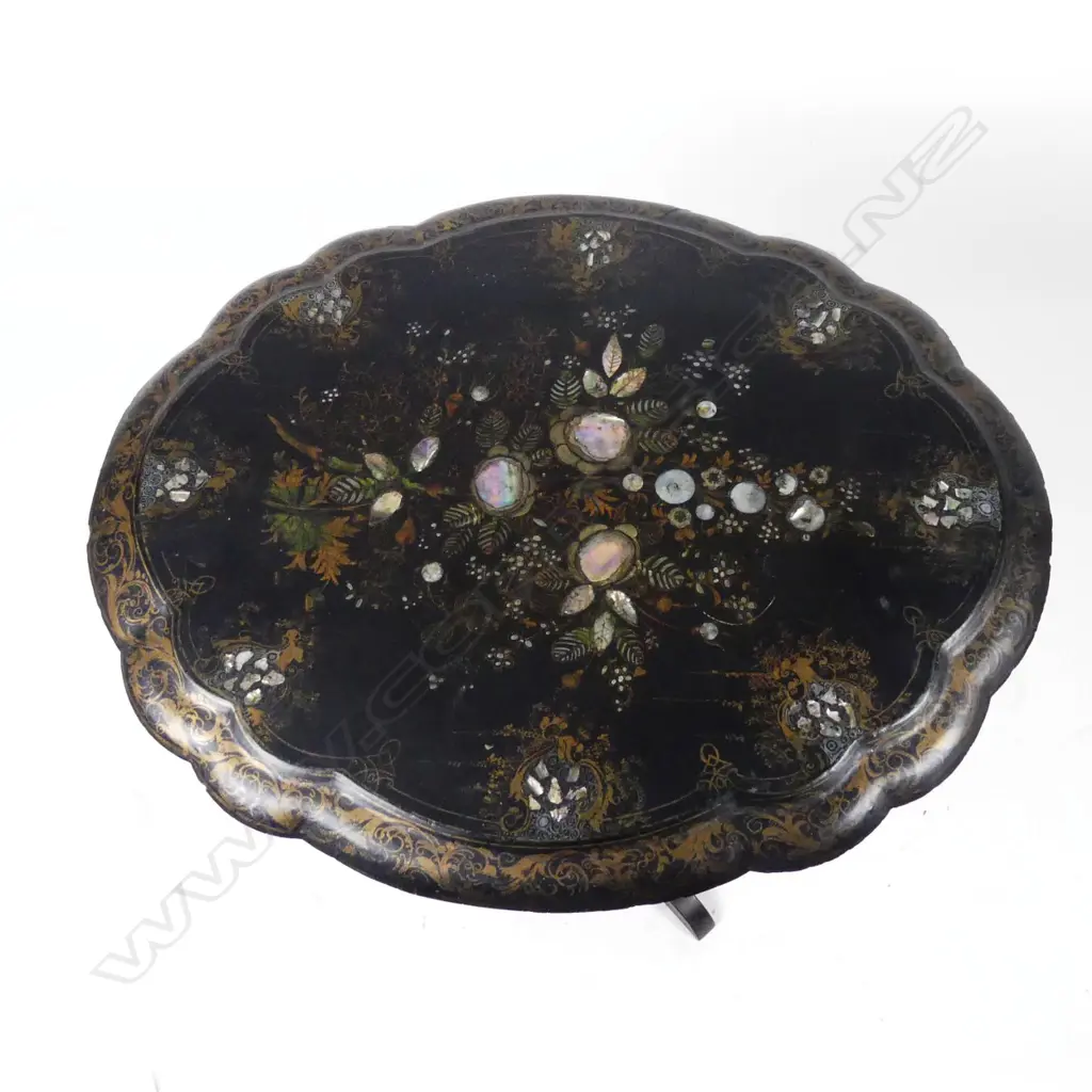 A Victorian papier maché tilt top occasional table Image 1++