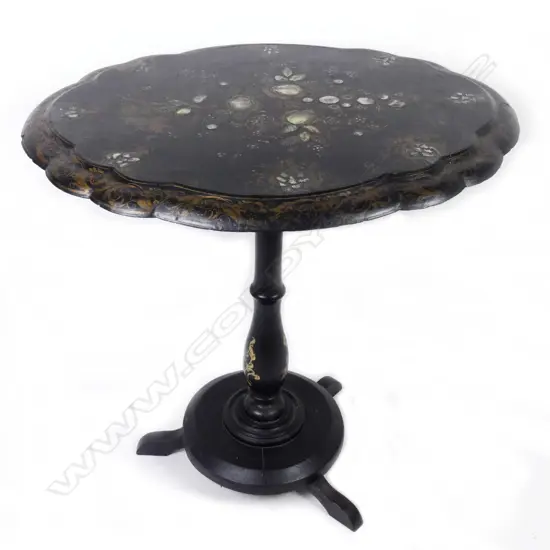 A Victorian papier maché tilt top occasional table