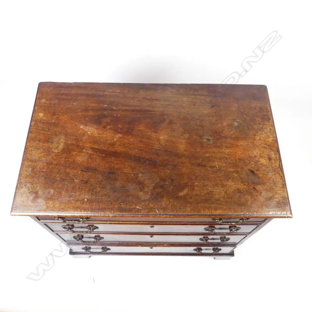 A small proportioned 19thC mahogany chest of four drawers Image 1++
