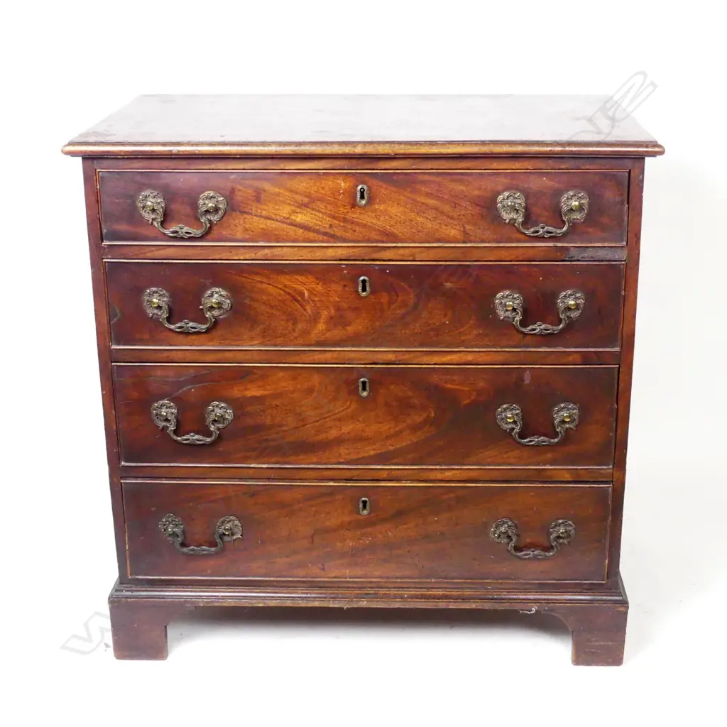 A small proportioned 19thC mahogany chest of four drawers Image 1++