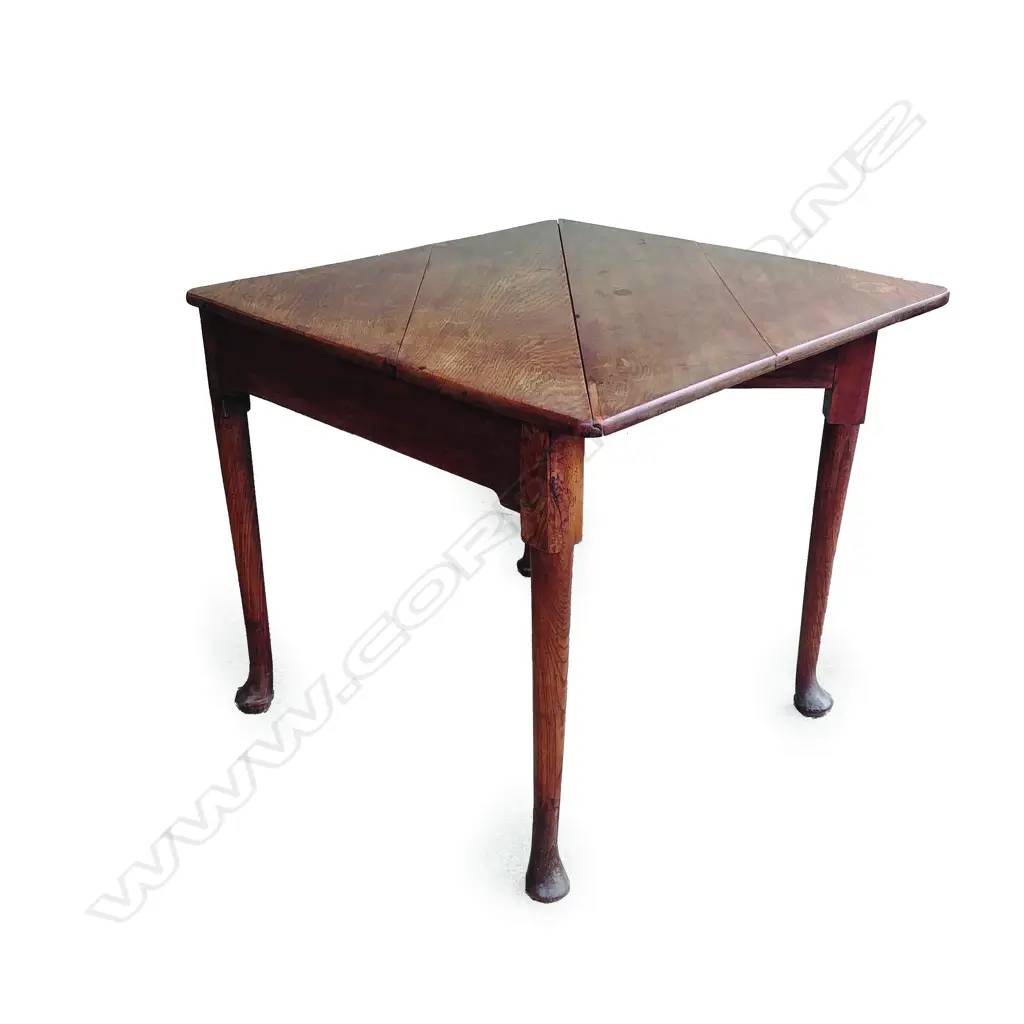 A late Victorian oak triangle drop-leaf table Image 1++