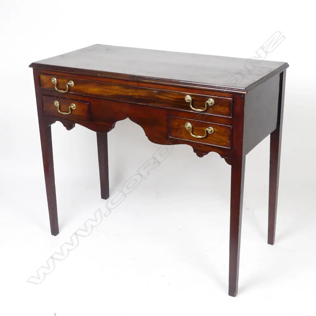 A Georgian walnut lowboy Image 1++