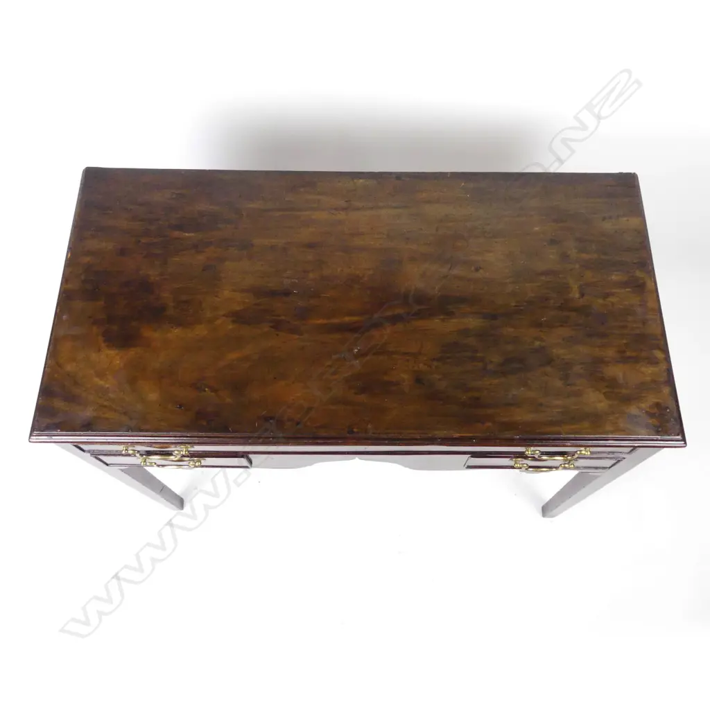 A Georgian walnut lowboy Image 1++