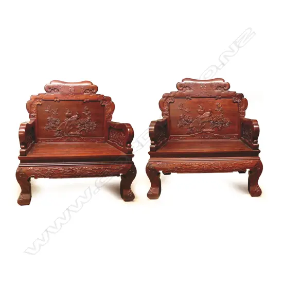 A pair of Chinese rosewood throne style chairs