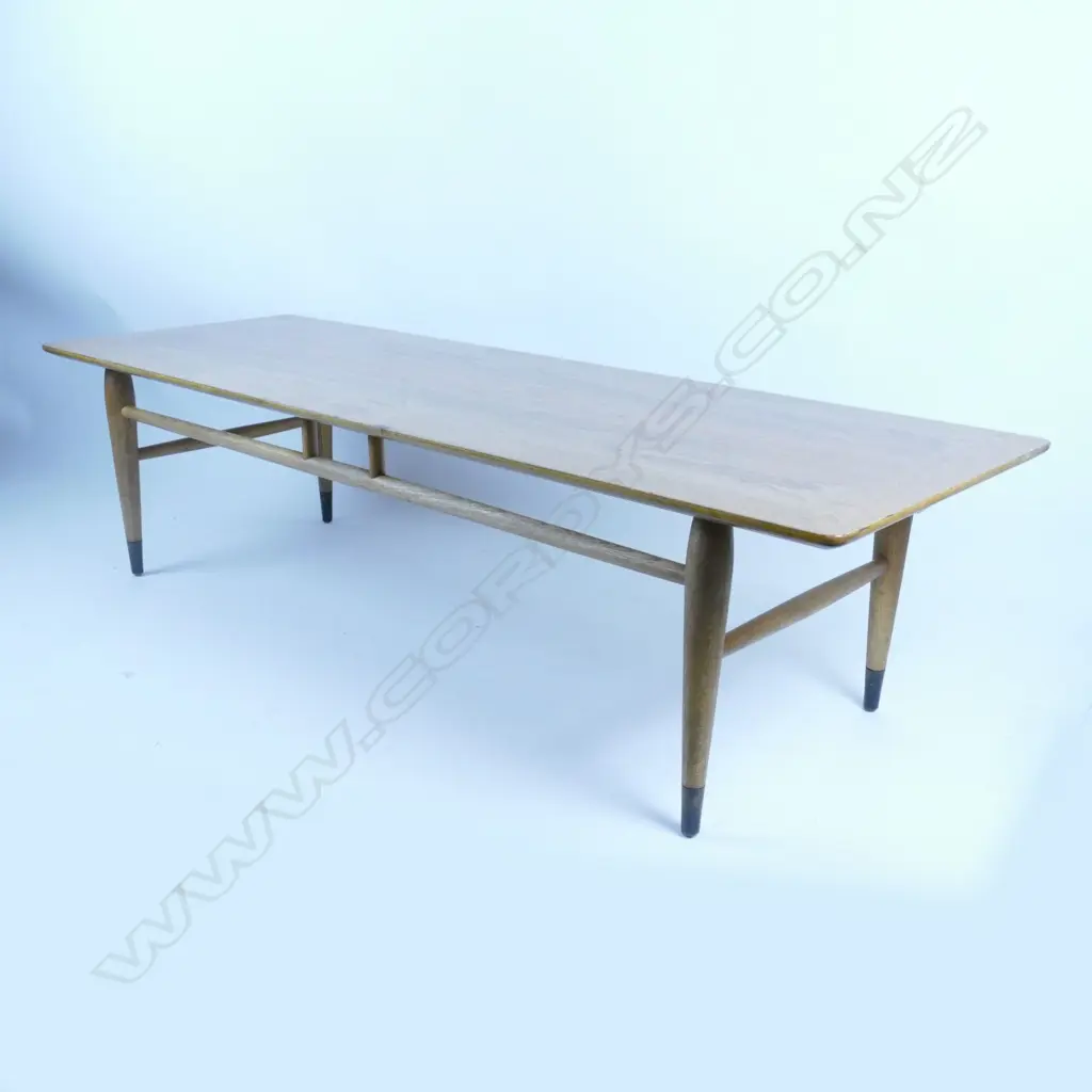 A mid-20thC teak long coffee table Image 1++