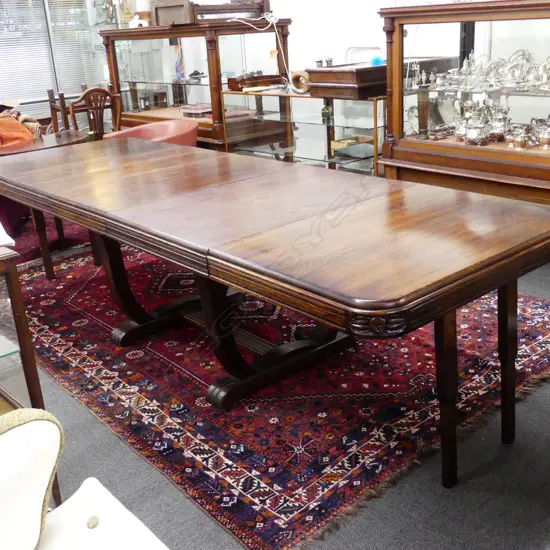 A French oak Art Deco dining table and chairs