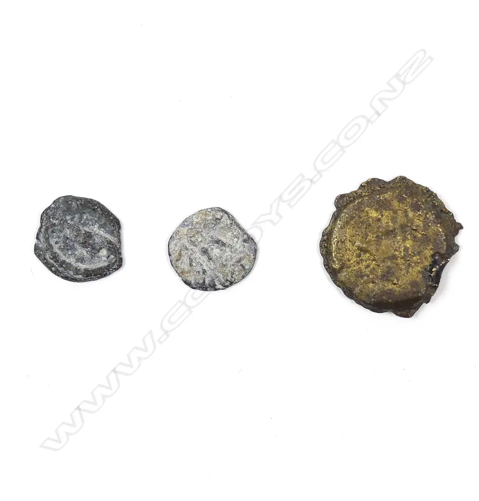 Three ancient bronze coins Image 1++