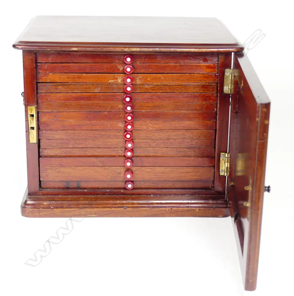 A mahogany coin collector's cabinet Image 1++