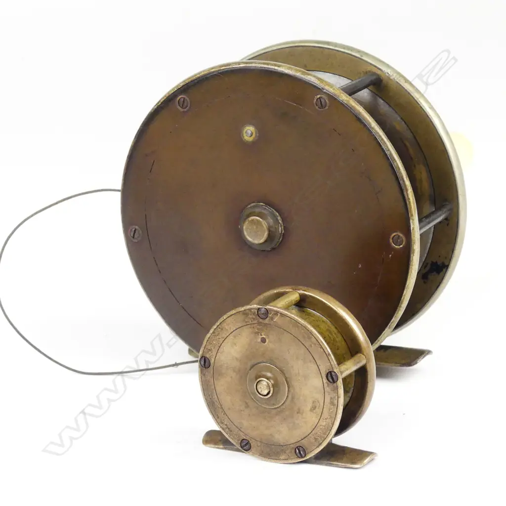 A 19thC large 4¾" Malloch brass salmon reel with another smaller Image 1++