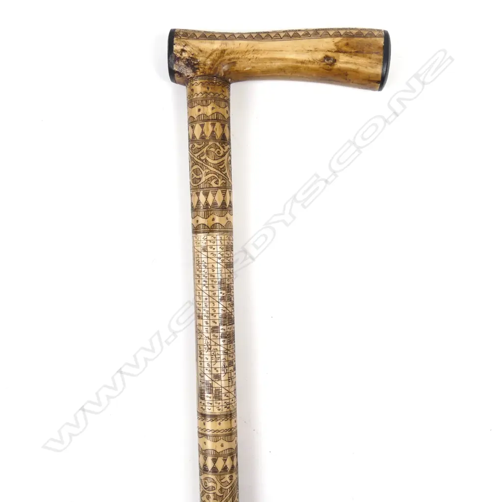 An Indonesian simulated bone walking stick Image 1++