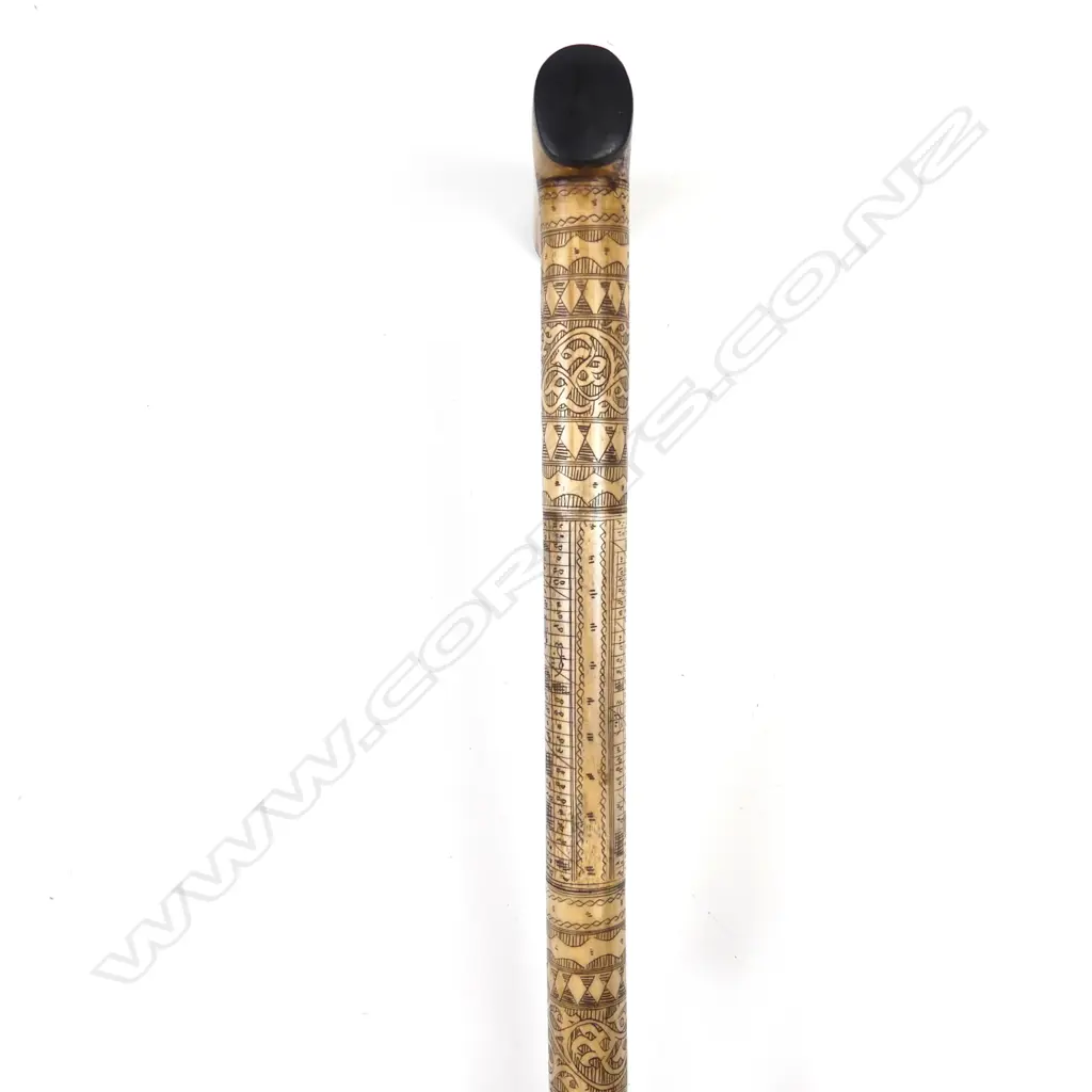 An Indonesian simulated bone walking stick Image 1++
