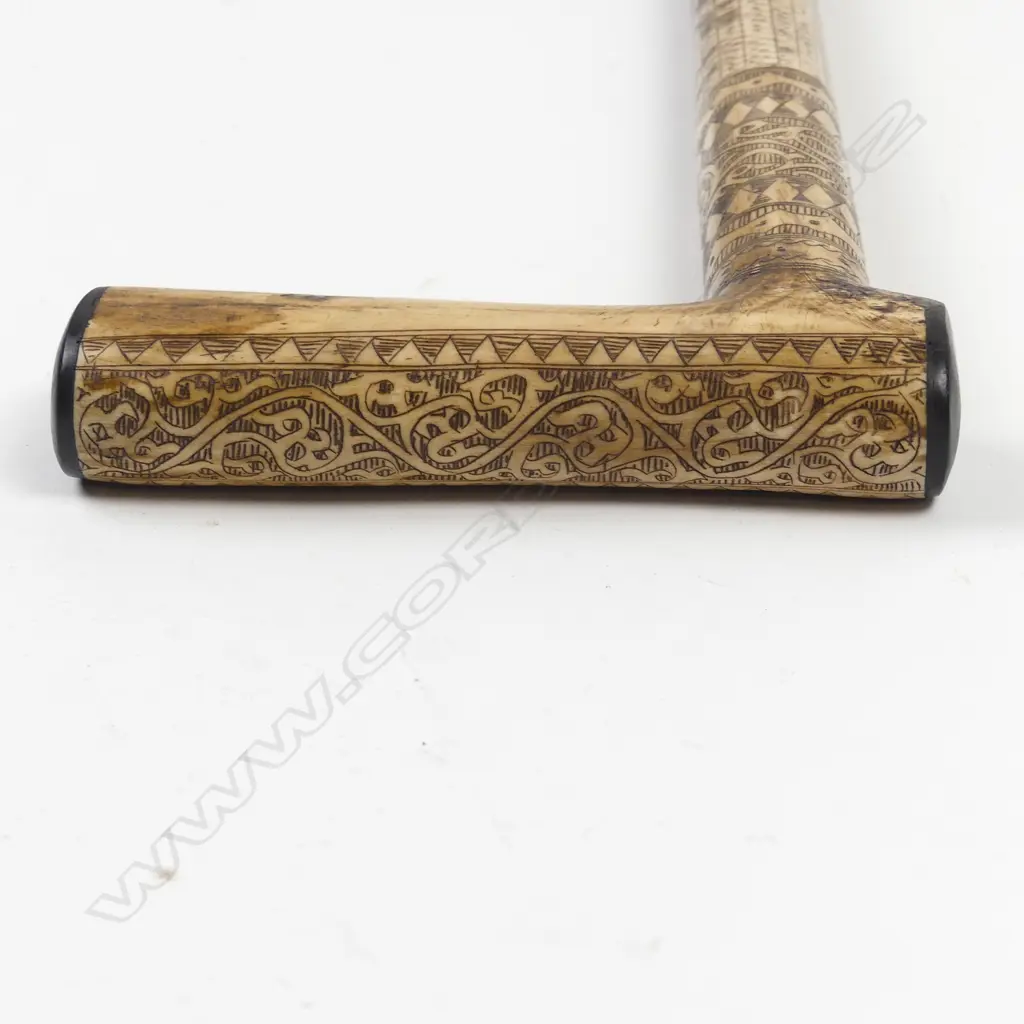 An Indonesian simulated bone walking stick Image 1++