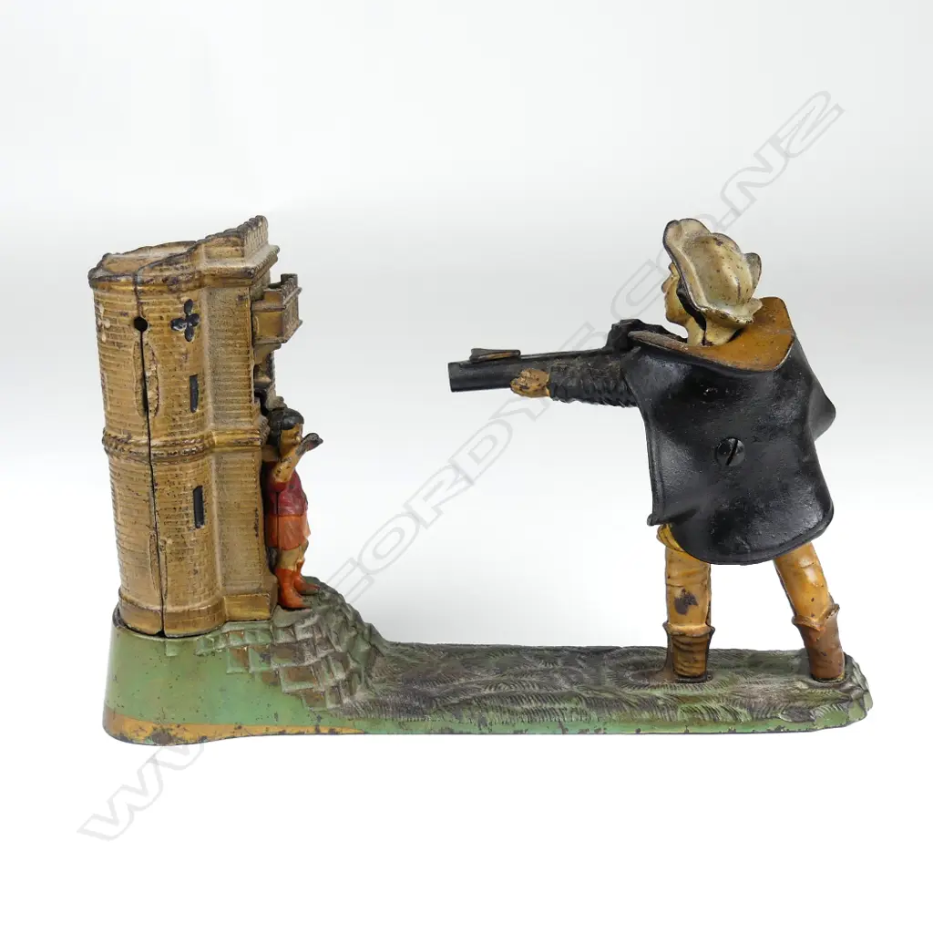 A vintage cast iron money bank Image 1++