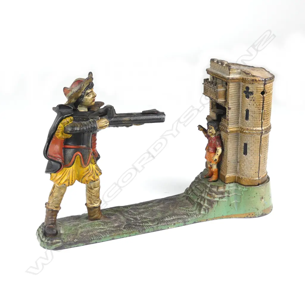 A vintage cast iron money bank Image 1++