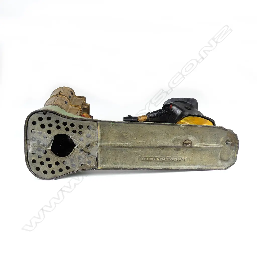 A vintage cast iron money bank Image 1++