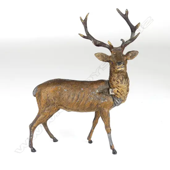 A vintage European spelter money bank