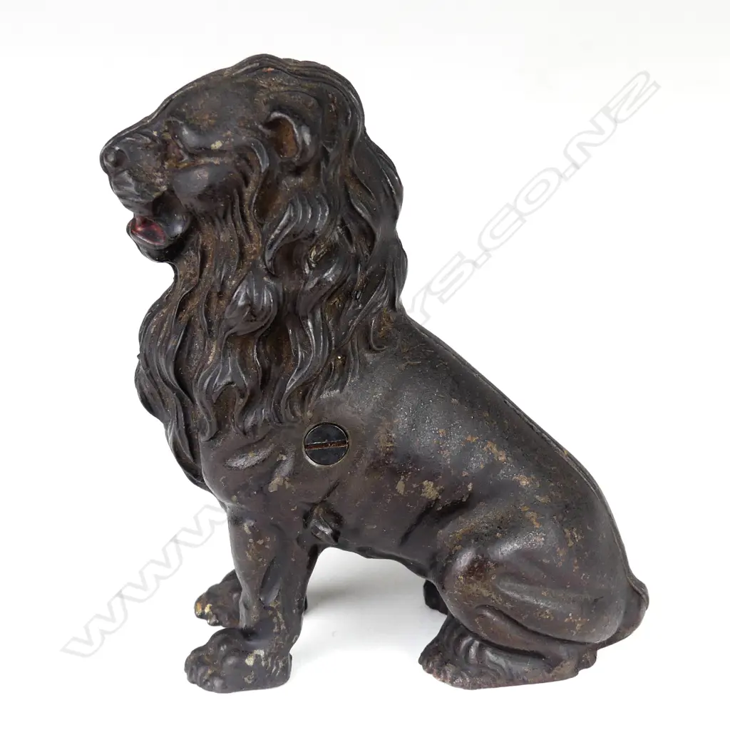 A vintage cast iron money bank Image 1++